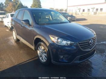  Salvage Mazda Cx