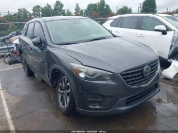  Salvage Mazda Cx